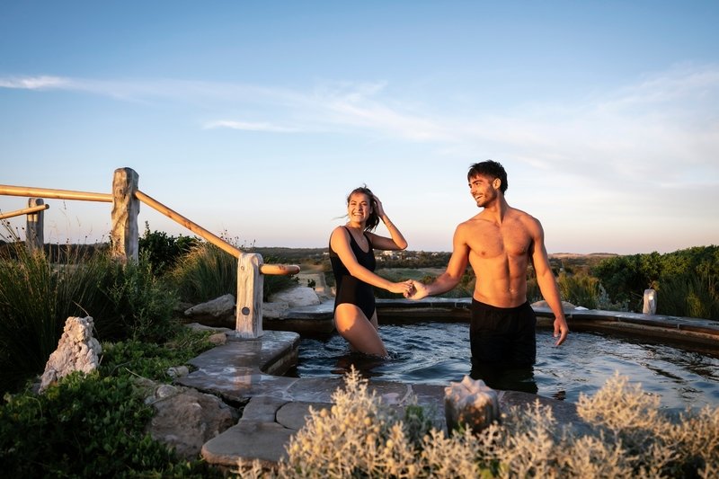 Two people in the Hilltop Pool