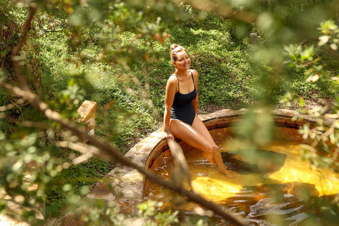 A woman bathing in nature